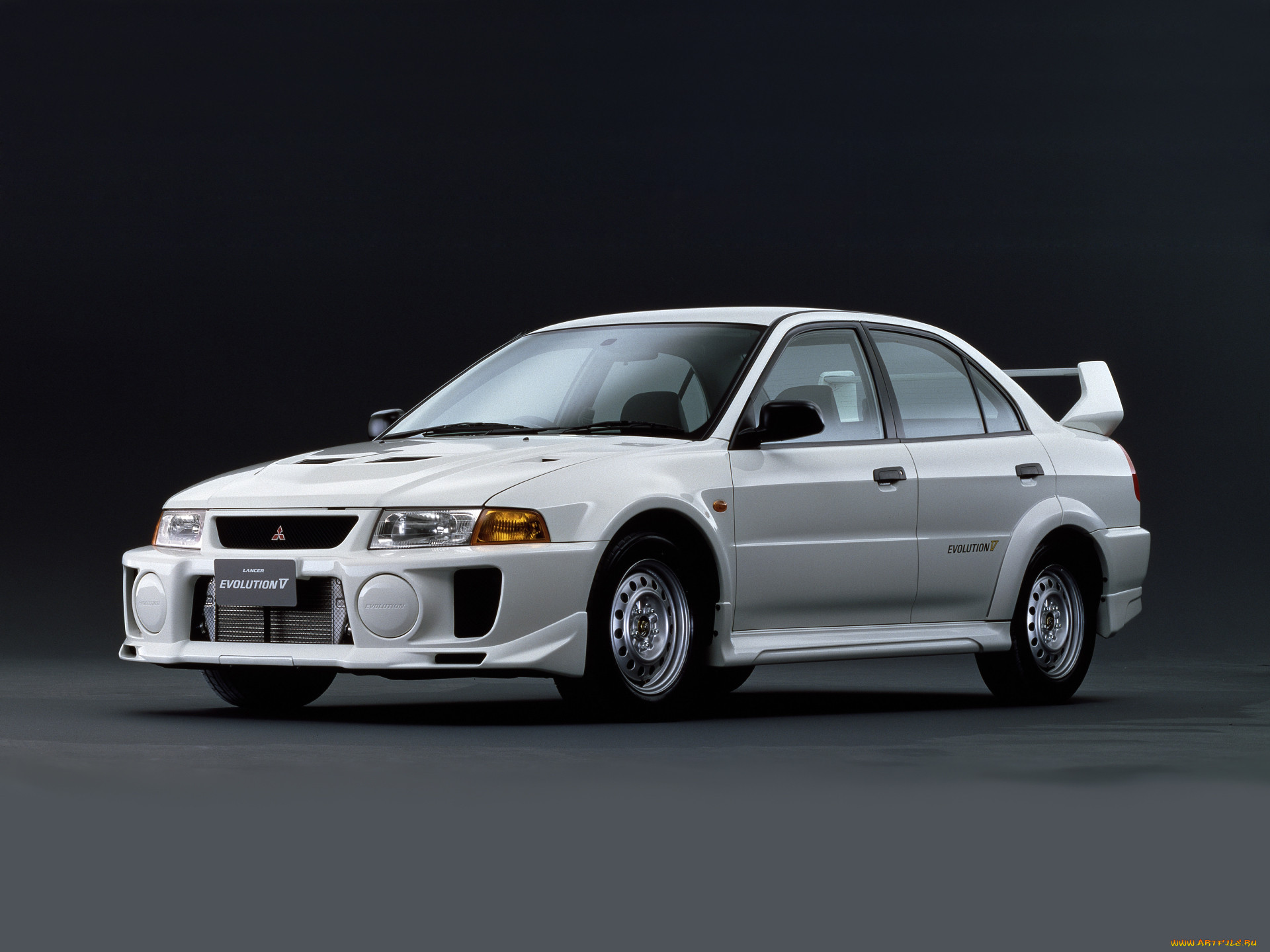 Evo s v. Митсубиши Лансер Эволюшн 5. Mitsubishi Lancer Evolution 5 поколение. Mitsubishi Lancer Evolution 1998. Lancer EVO 1998.